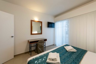 gallery galaxias hotel cozy standard rooms with big beds, flat-TV screen, and many amenities